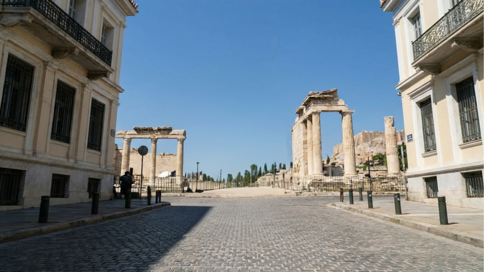 A street in historic Plaka in Athens, lined with ruined temples in the city centre adding mosaic at heart under Acropolis, Parhenon in Athens